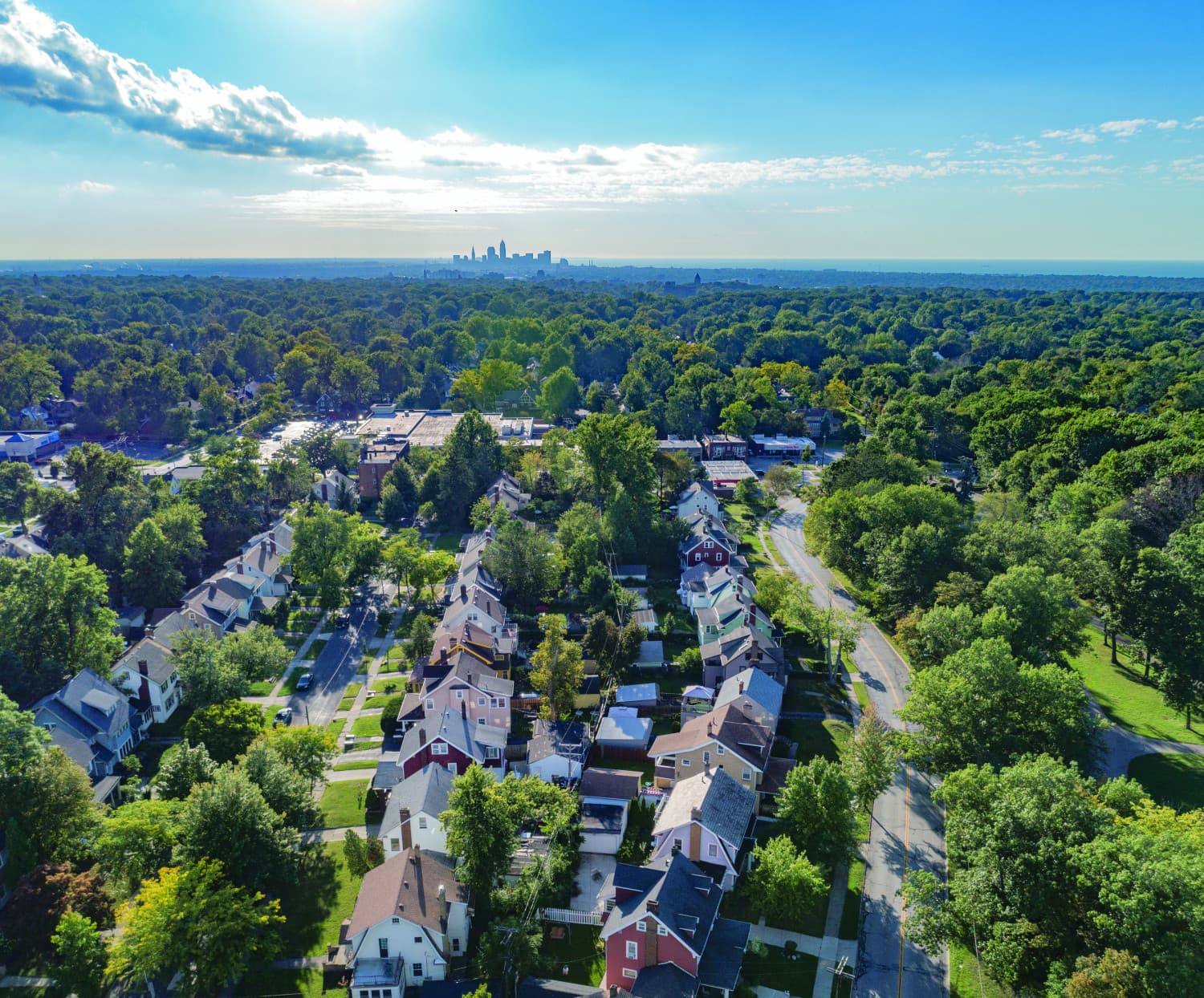 Aerial view of a residential Cleveland Heights neighborhood with downtown Cleveland in the distance