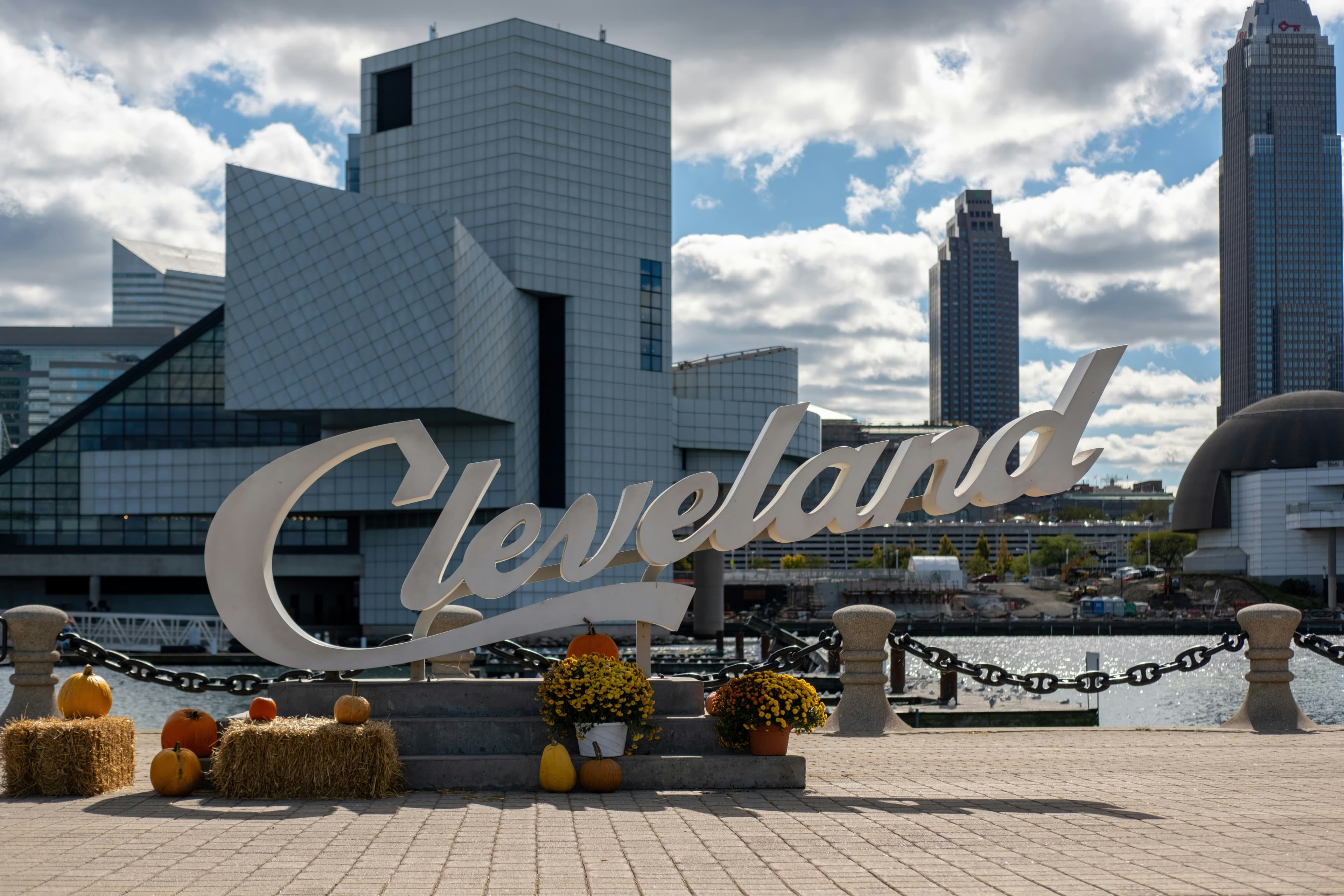 Cleveland script sign with the downtown skyline beyond