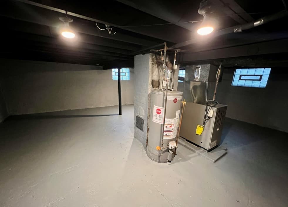 Basement mechanicals with new furnace and hot water heater