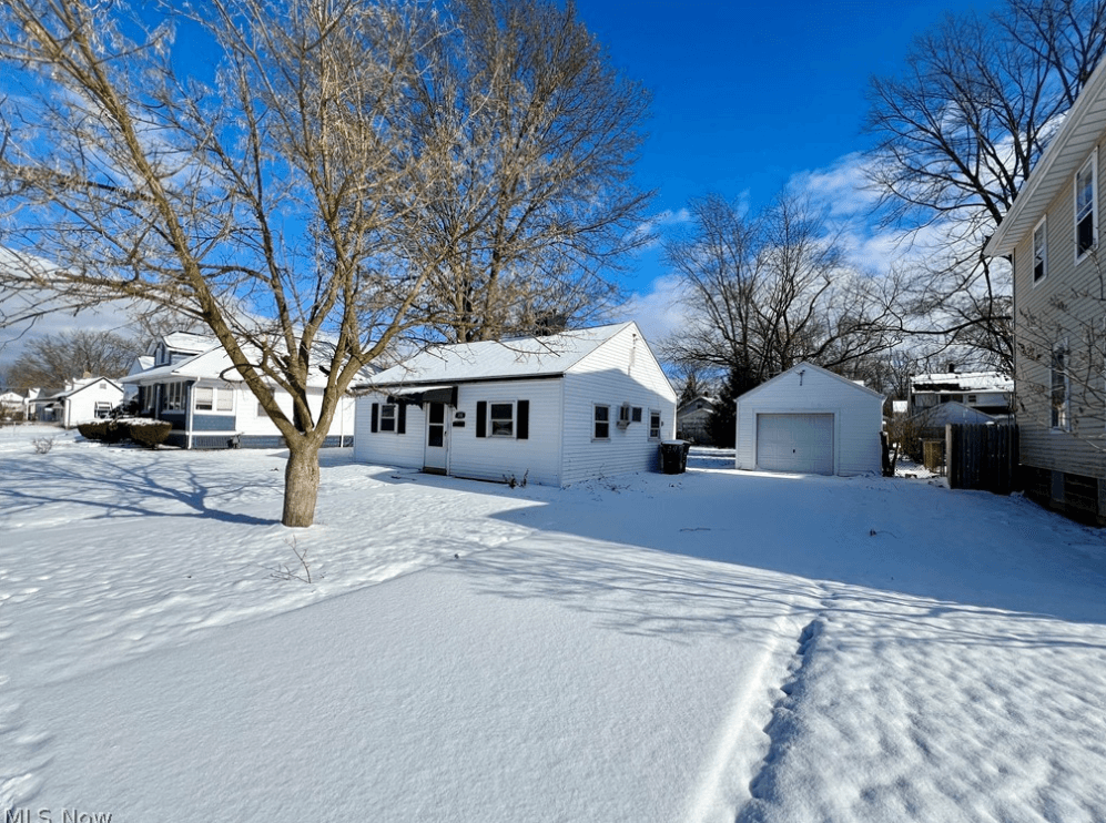 Finished Elyria house exterior and lot in winter
