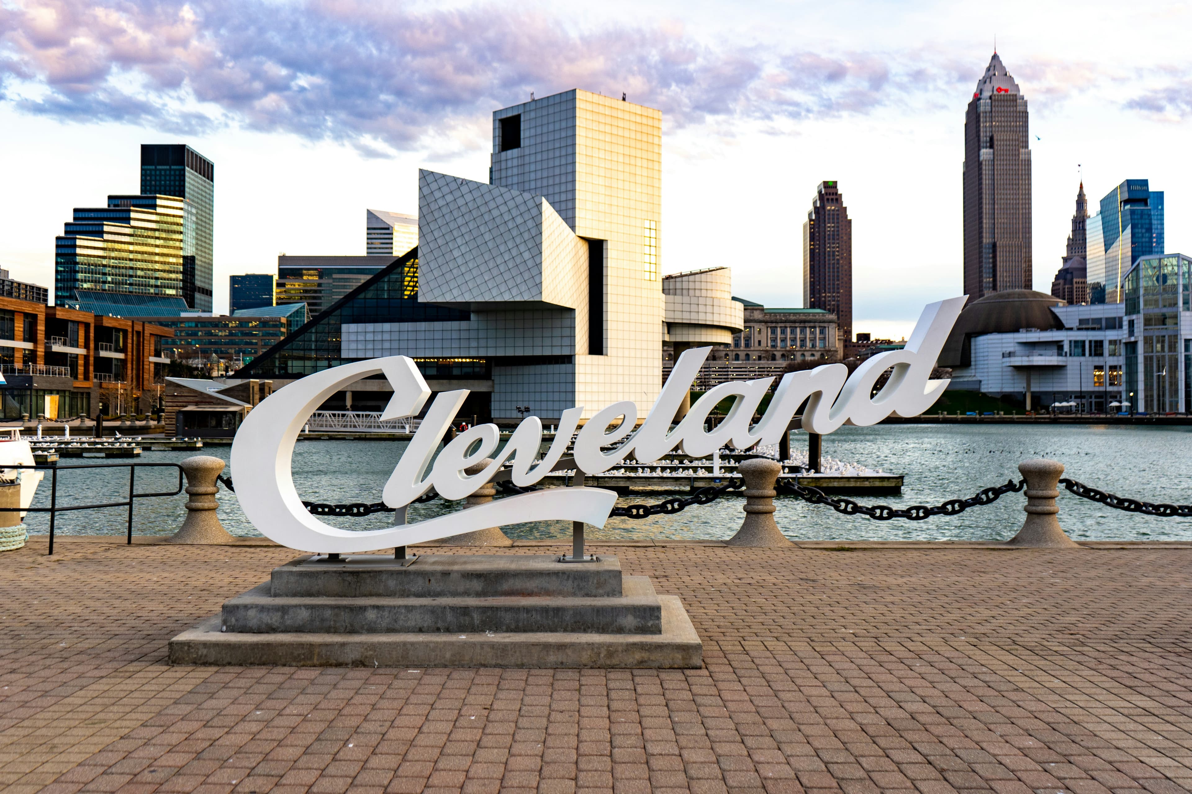 Cleveland script sign with the downtown skyline in the background